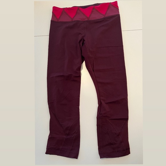 lululemon | Inspire Crop | size 6 | Maroon | rip on leg - Picture 1 of 7